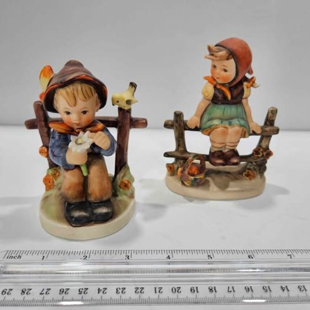 Vintage Hummel Boy and Girl Figurines on Fence